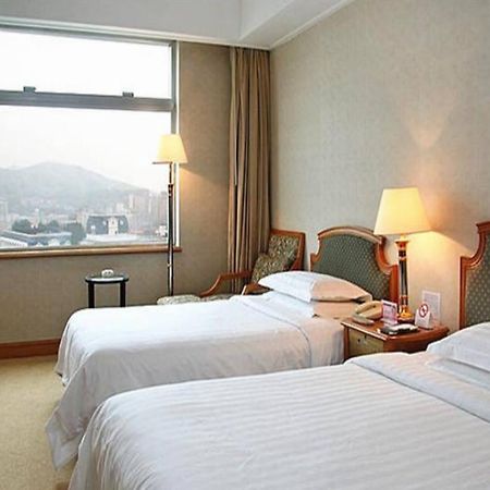Sea Horizon Hotel Dalian Bagian luar foto