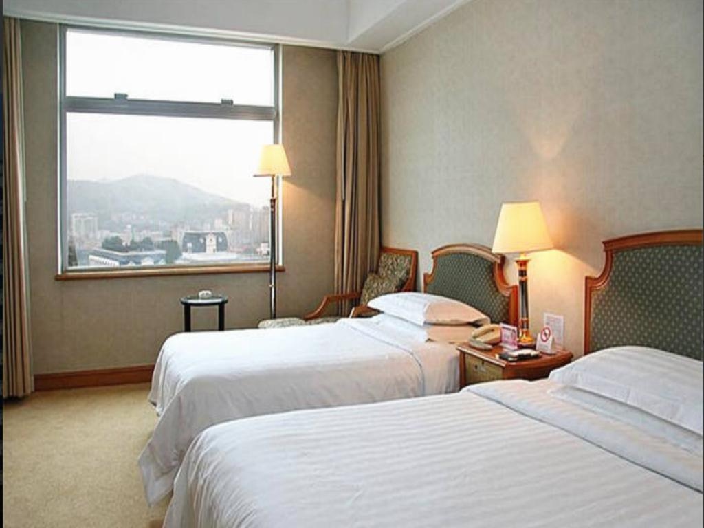 Sea Horizon Hotel Dalian Bagian luar foto