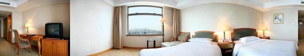 Sea Horizon Hotel Dalian Bagian luar foto